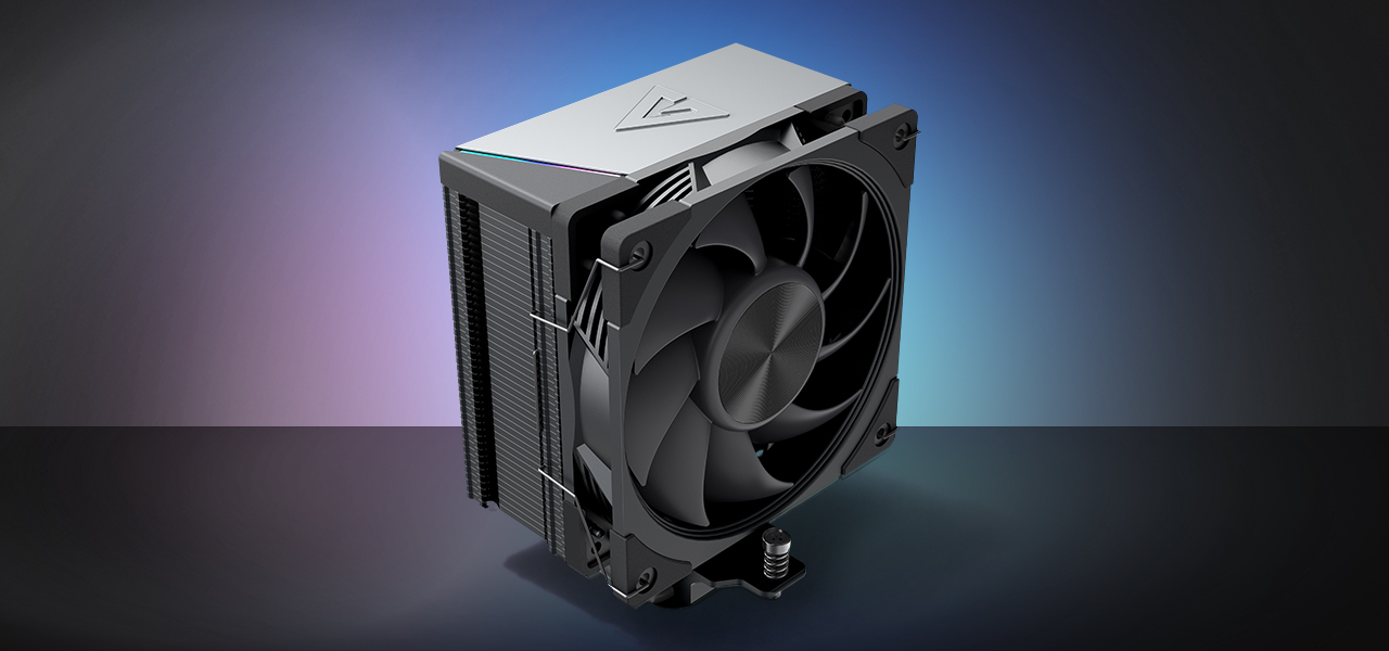 Zdjęcie chłodzenia MODECOM Volcano 0C na tle z poświatą kolorów, widok pod kątem z góry z widocznym od frontu wentylatorem i aluminiowym topem